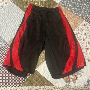 Boys black and red Bcg shorts from Academy size 8.